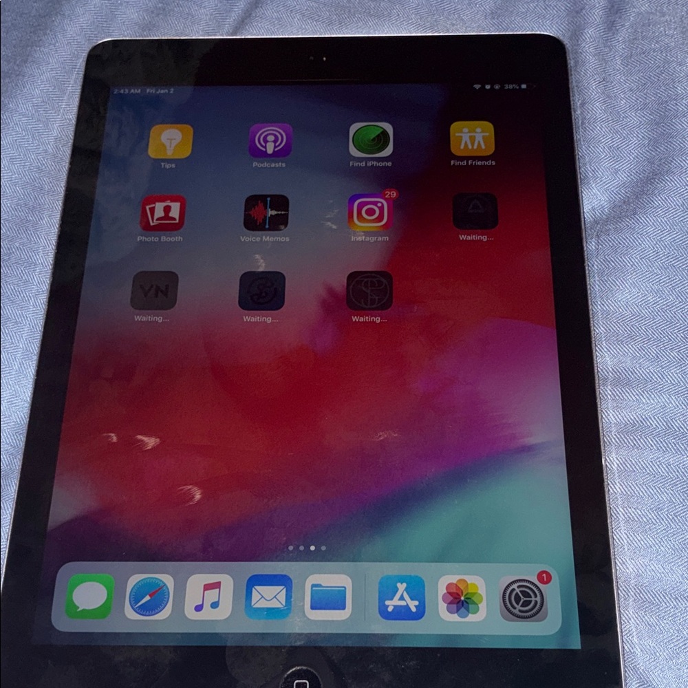 Apple Tablet with Vibrant Red and Blue Display